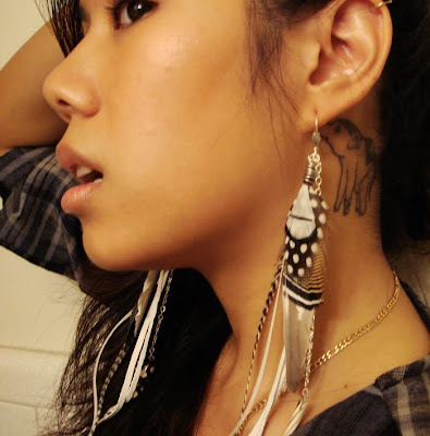 Demi Lovato Tattoo Behind Ear
